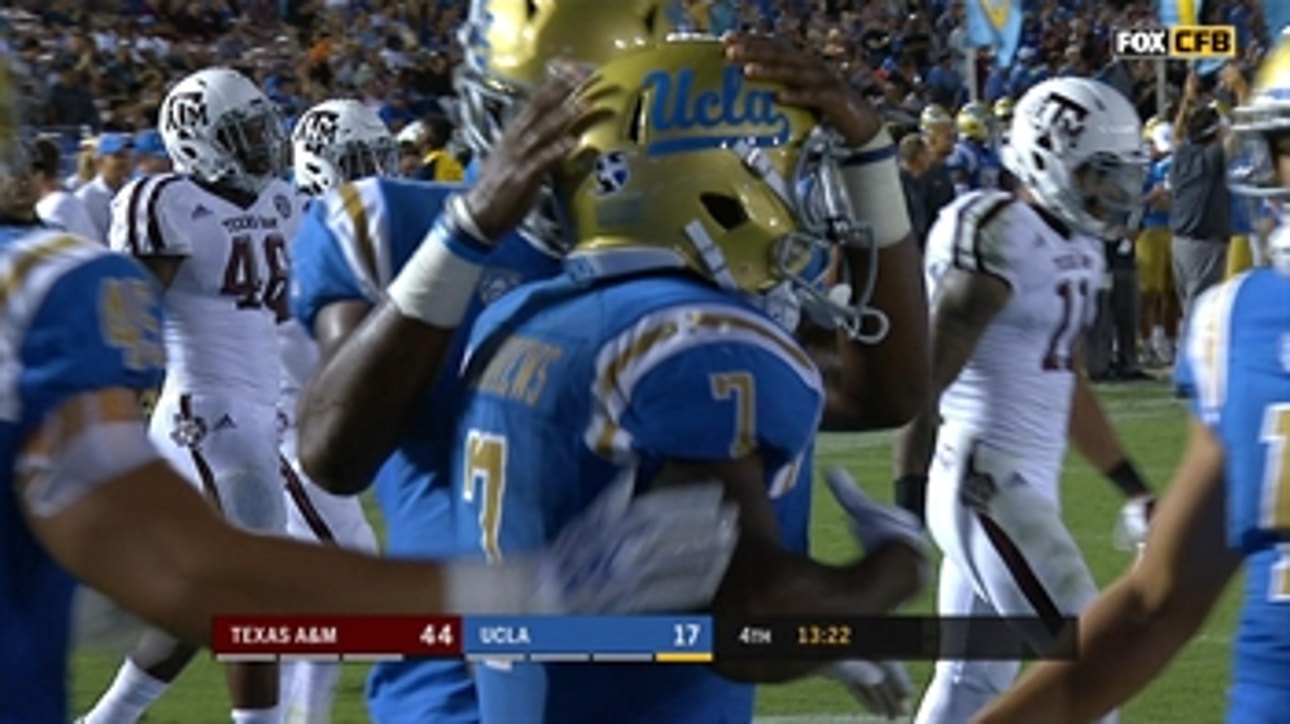 UCLA's Darren Andrews scores on 9-yard screen pass