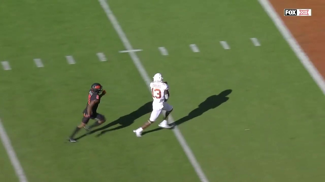Texas' Brennan Eagles takes Sam Ehlinger pass 41 yards for a TD to tie it up vs. No. 6 Oklahoma St., 14-14