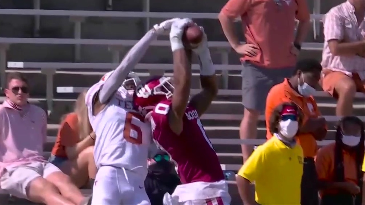 Woodi Washington picks off Sam Ehlinger in the end zone in 4th quarter of Red River Showdown