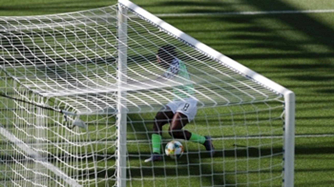 Nigeria's Asisat Oshoala finishes from an absurd angle to go up 2-0