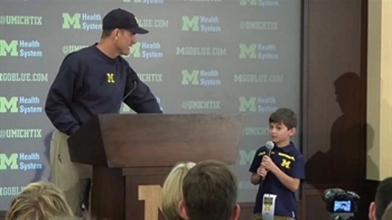 Cute kid asks Jim Harbaugh how much milk he needs to drink to be a quarterback