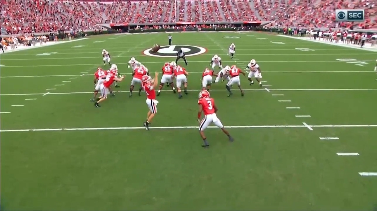 Stetson Bennett IV watches snap fly over his head, Tennessee recovers for touchdown