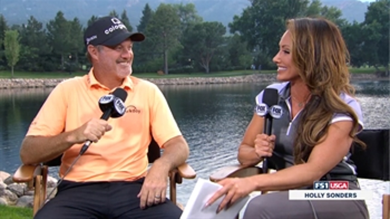 Jerry Kelly talks with Holly Sonders after shooting 4-under on Day 1 of the US Senior Open