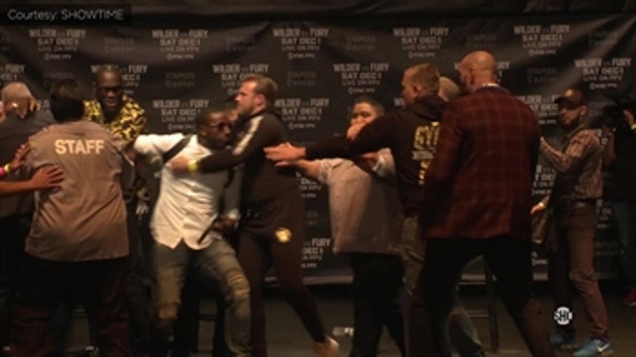 Tempers flare as Deontay Wilder, Tyson Fury get into shoving match