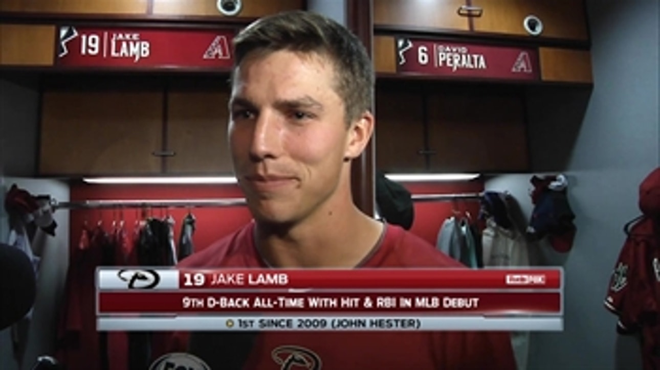 Lamb gets first hit in debut