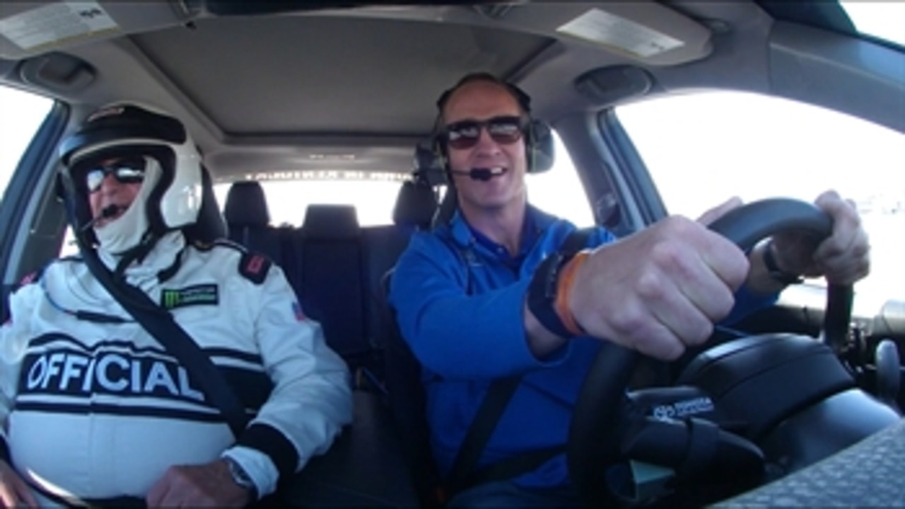 Peyton Manning talks with Darrell Waltrip as he pilots the Daytona 500 pace car ' FOX NASCAR