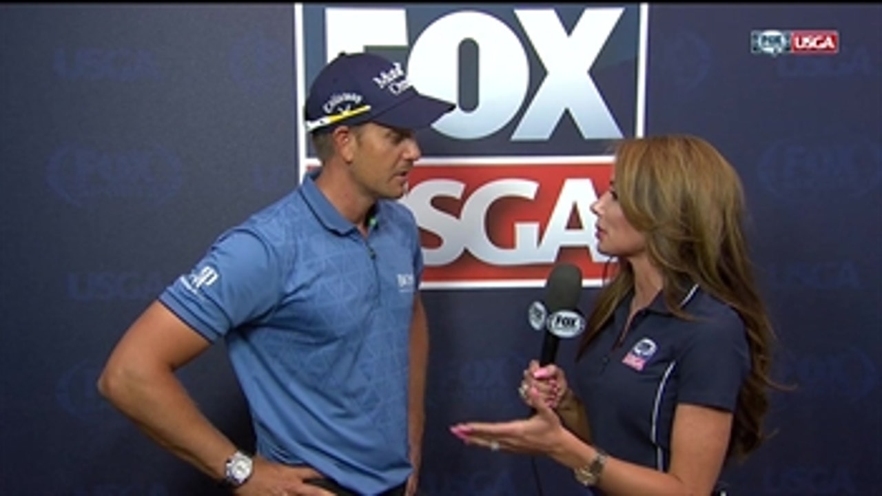 Henrik Stenson is happy after finishing with 65 in Round 1
