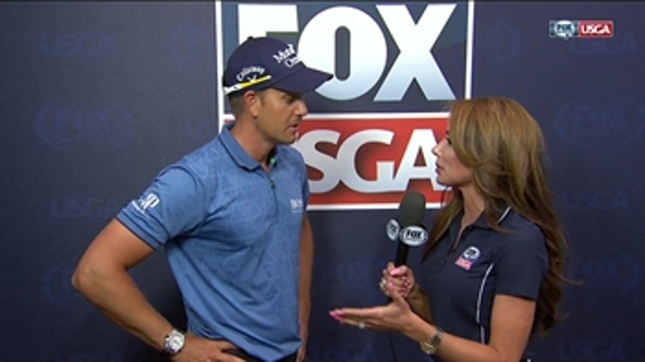 Henrik Stenson is happy after finishing with 65 in Round 1