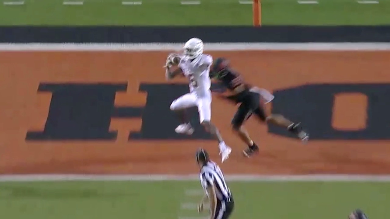 Texas' Sam Ehlinger connects with Joshua Moore for a 15-yard TD in overtime, Longhorns lead 41-34