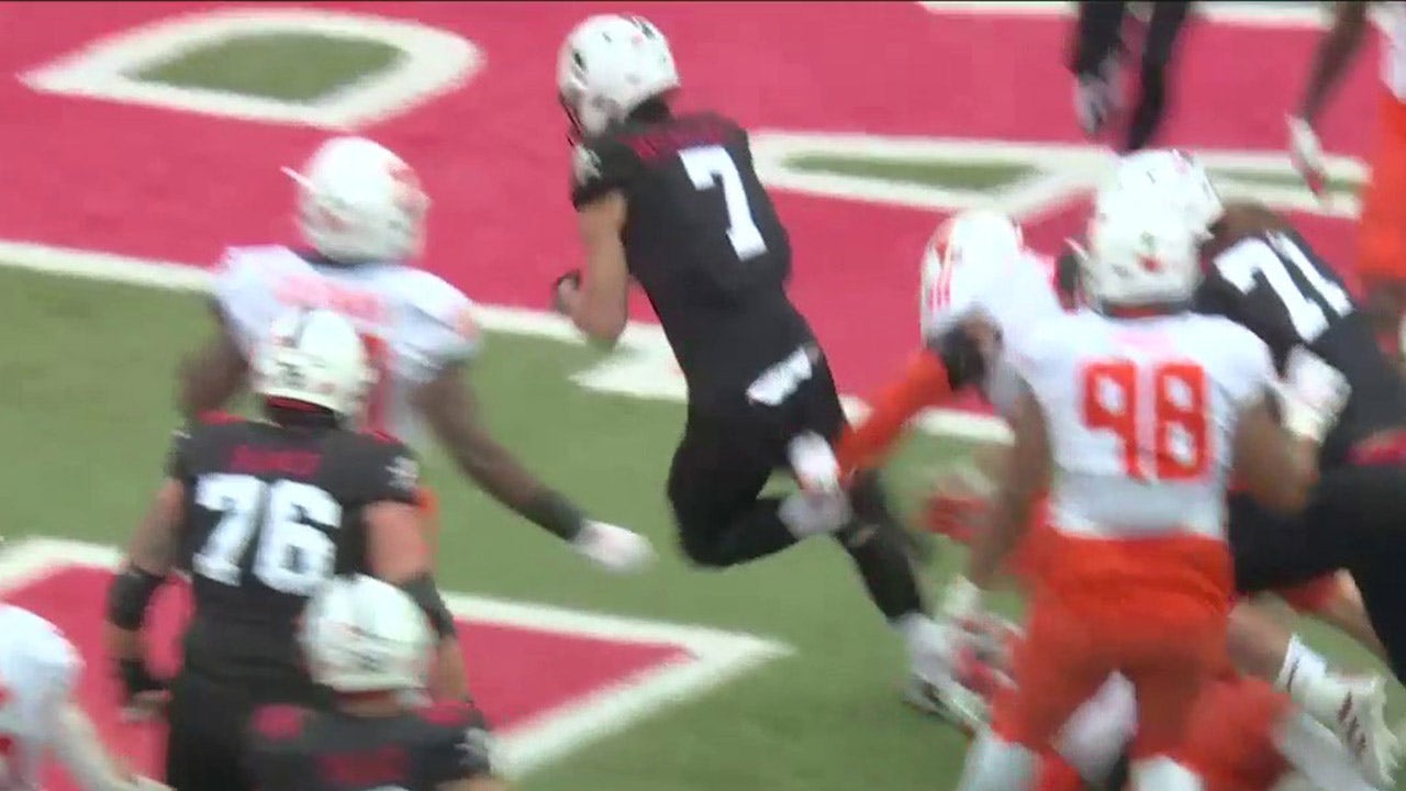 Luke McCaffery finds pay dirt after the 5-yard rush to tie it up with Illinois, 7-7