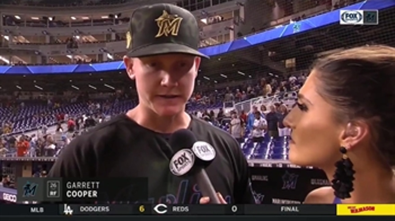 Garrett Cooper says he’s happy to be back and get the win