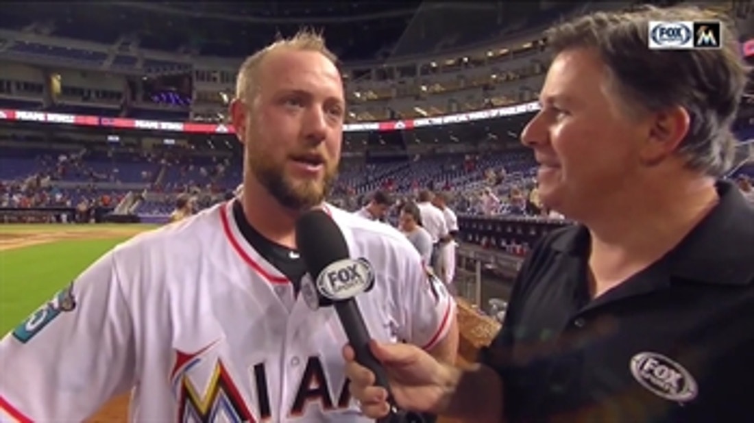 Bryan Holaday talks with Craig Minervini after his walk-off hit
