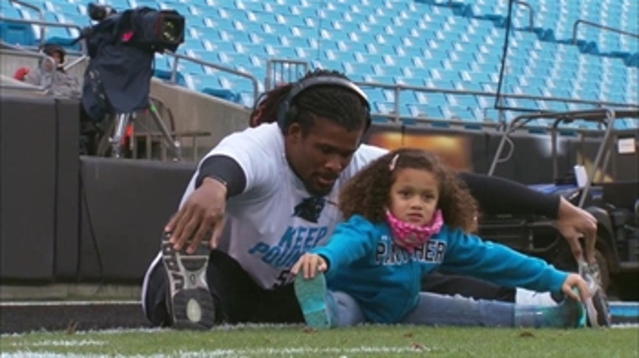 DeAngelo Williams warms up with daughter