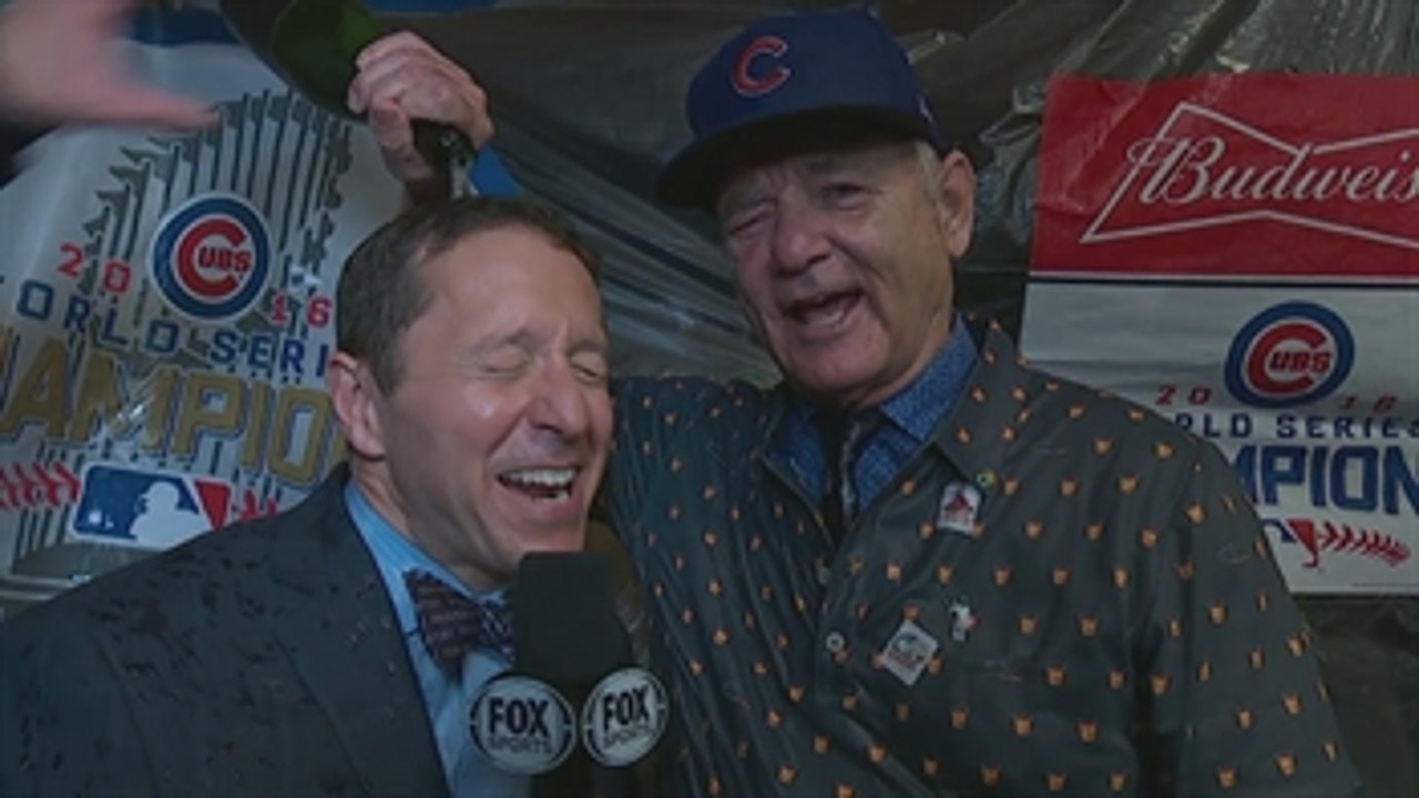 Bill Murray poured champagne on Ken Rosenthal after the Cubs won the World Series