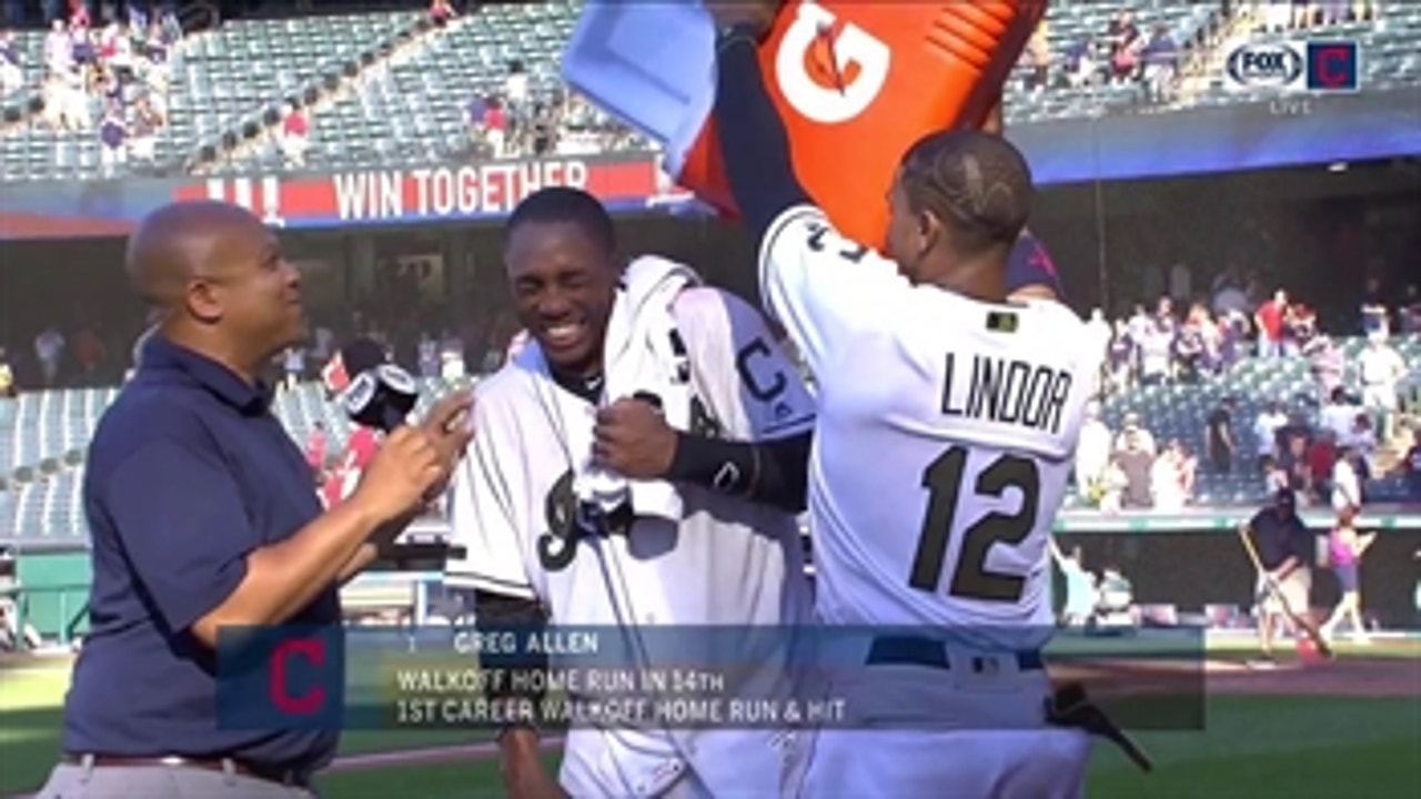 Greg Allen gets doused by Frankie in postgame interview after first game-winner