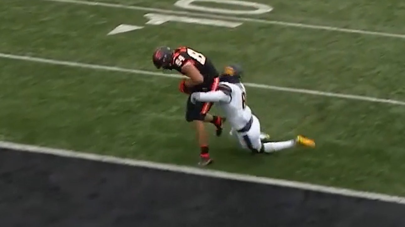 Oregon State's Tristan Gebbia connects deep with Teagan Quitoriano for a 35-yard touchdown