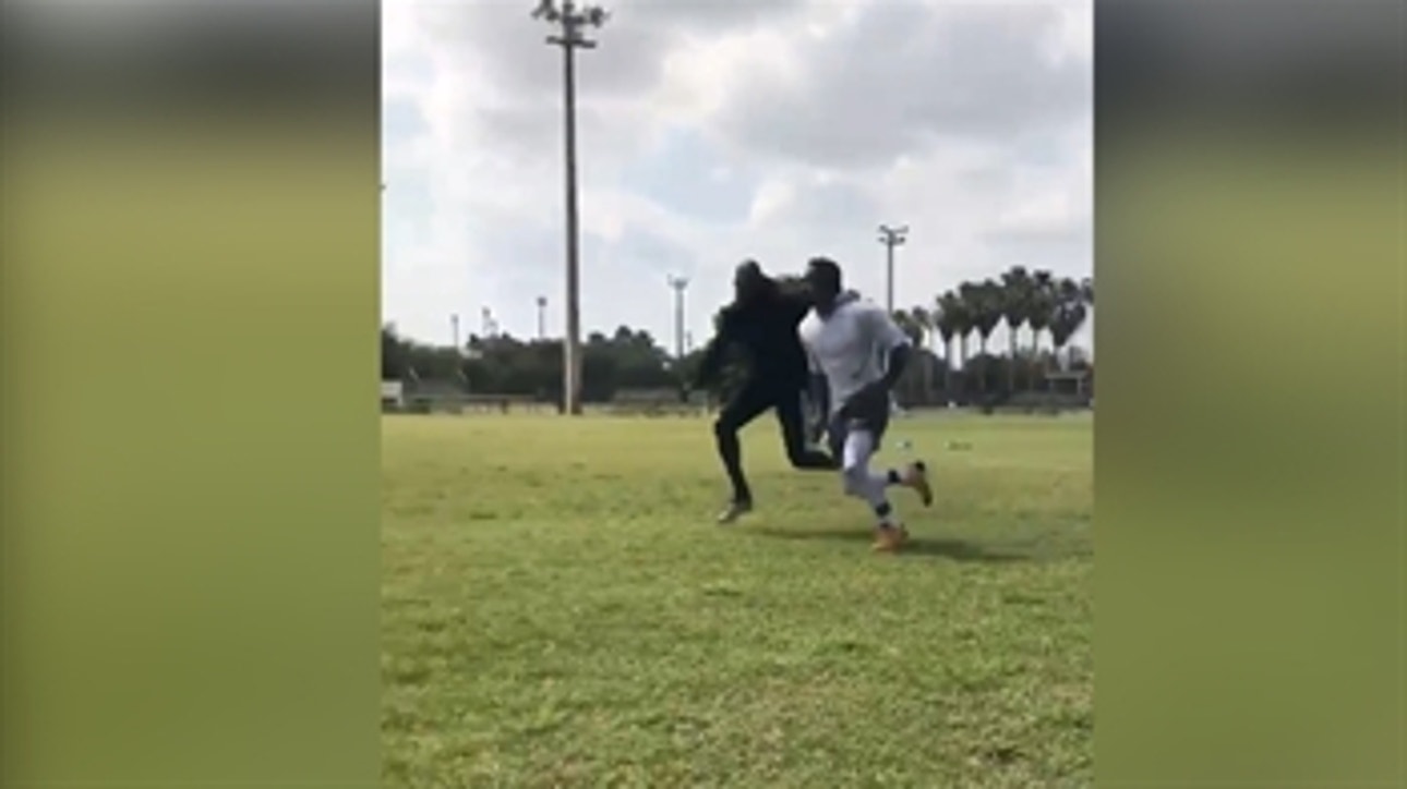 Chad Ochocinco does his best to cover Antonio Brown…