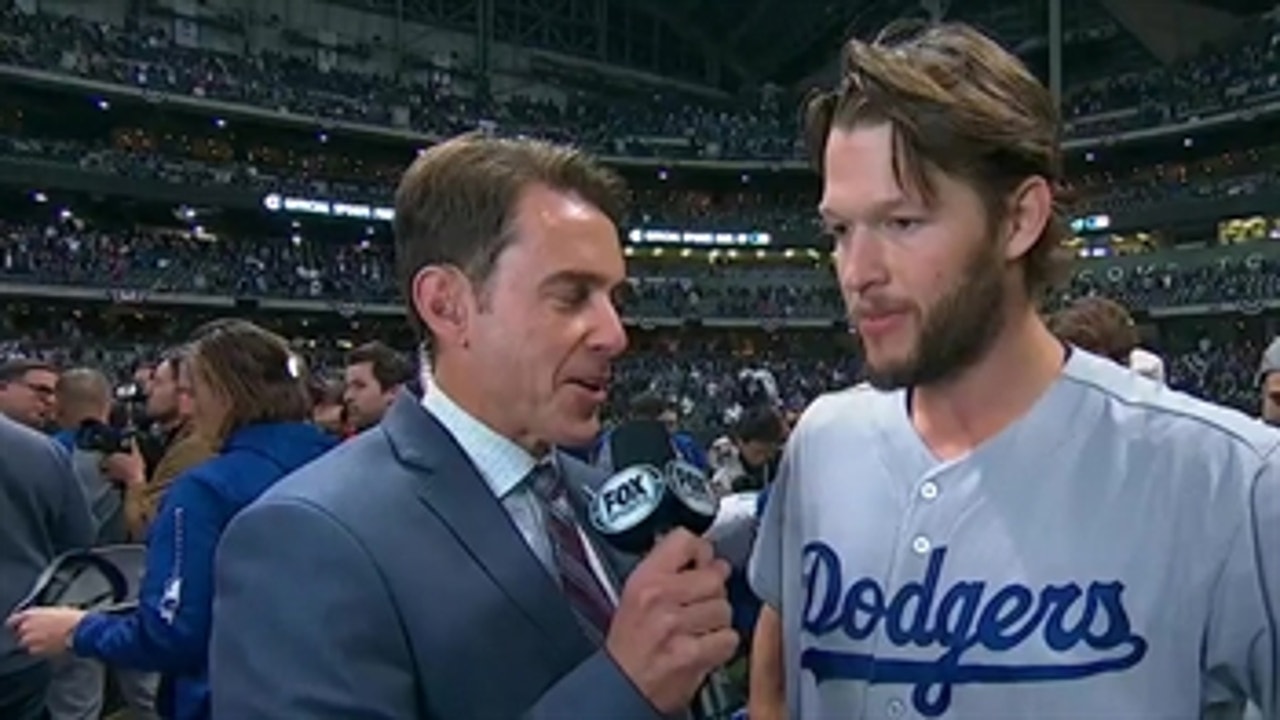 Clayton Kershaw talks with Tom Verducci after closing down Game 7 of the NLCS