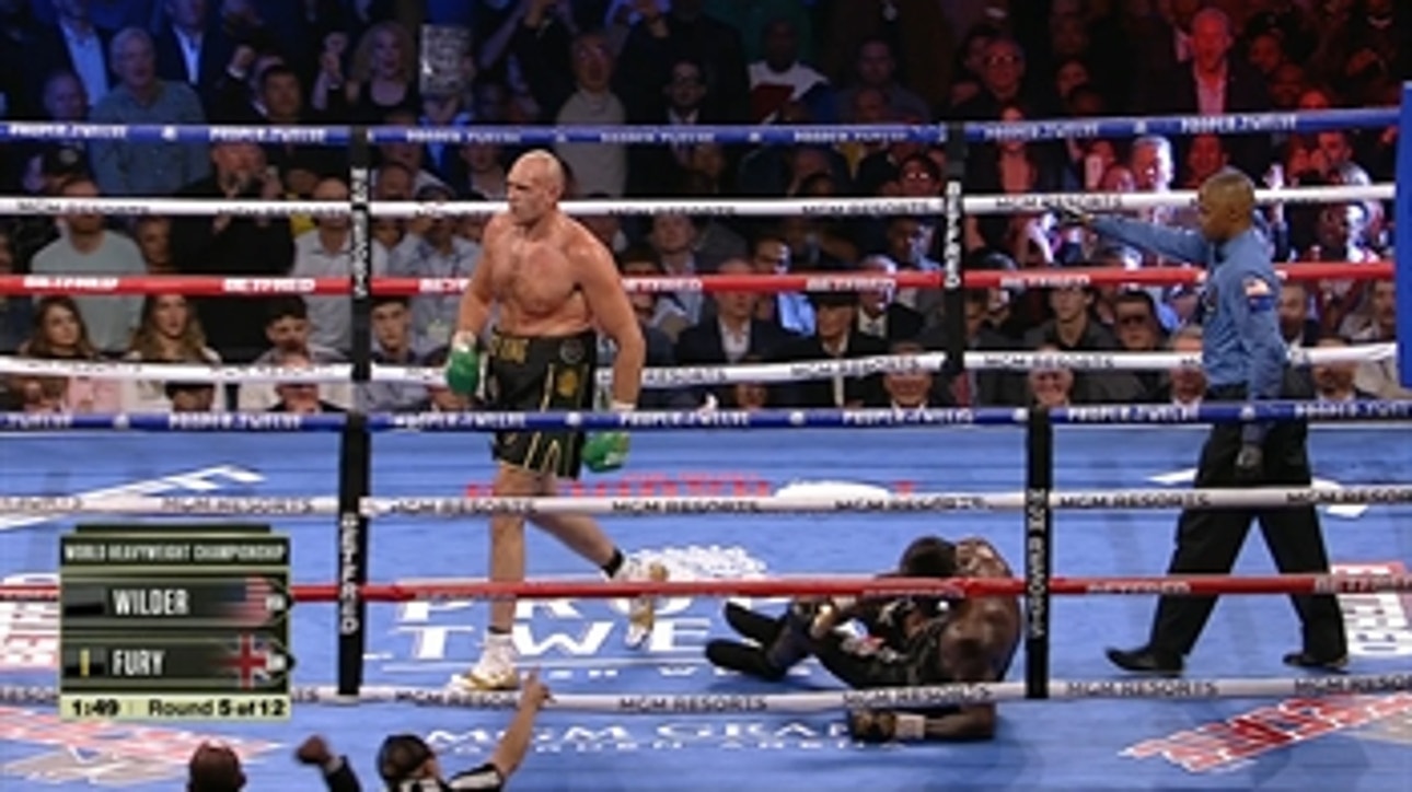 Tyson Fury knocks down Deontay Wilder, nearly puts away fight in Round 5