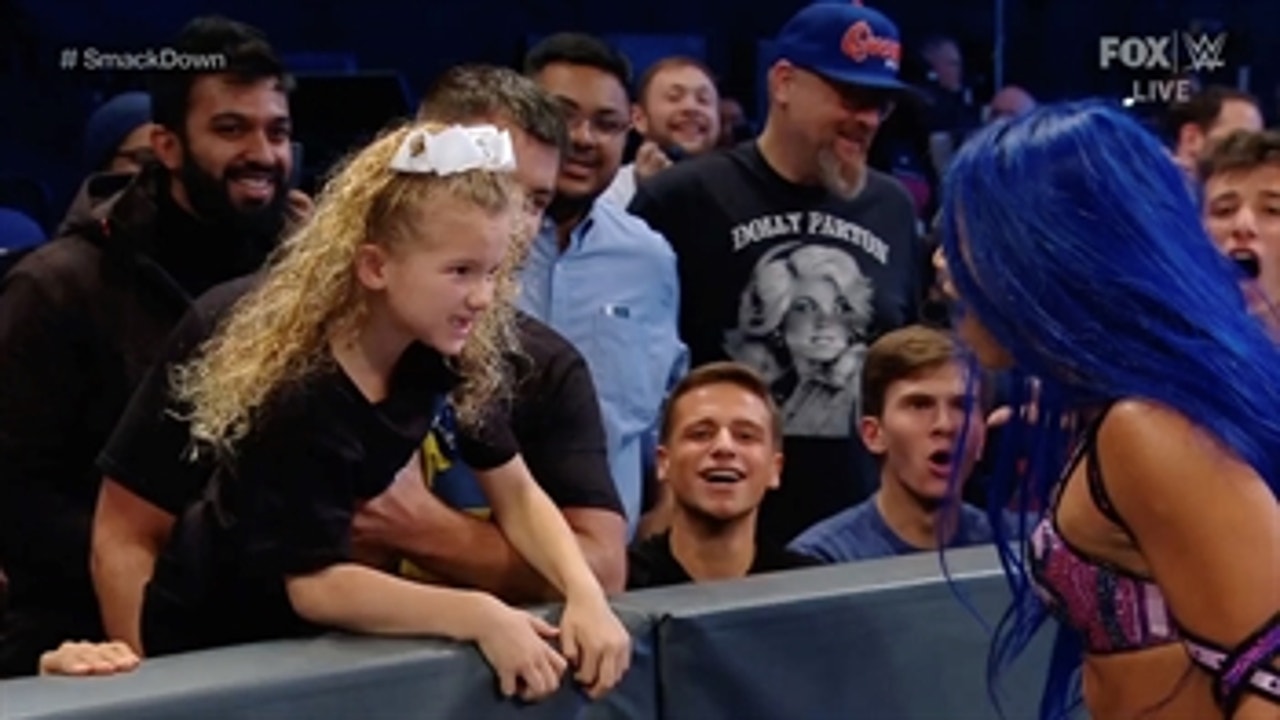 Sasha Banks tries to teach Lacey Evans a lesson in front of  Lacey's daughter