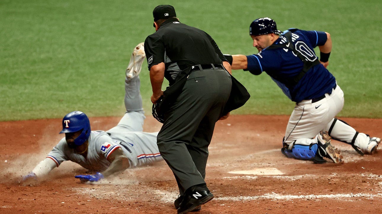 Adolis Garcia denied of two home runs on the same play in Rangers' 5-1 win over Rays