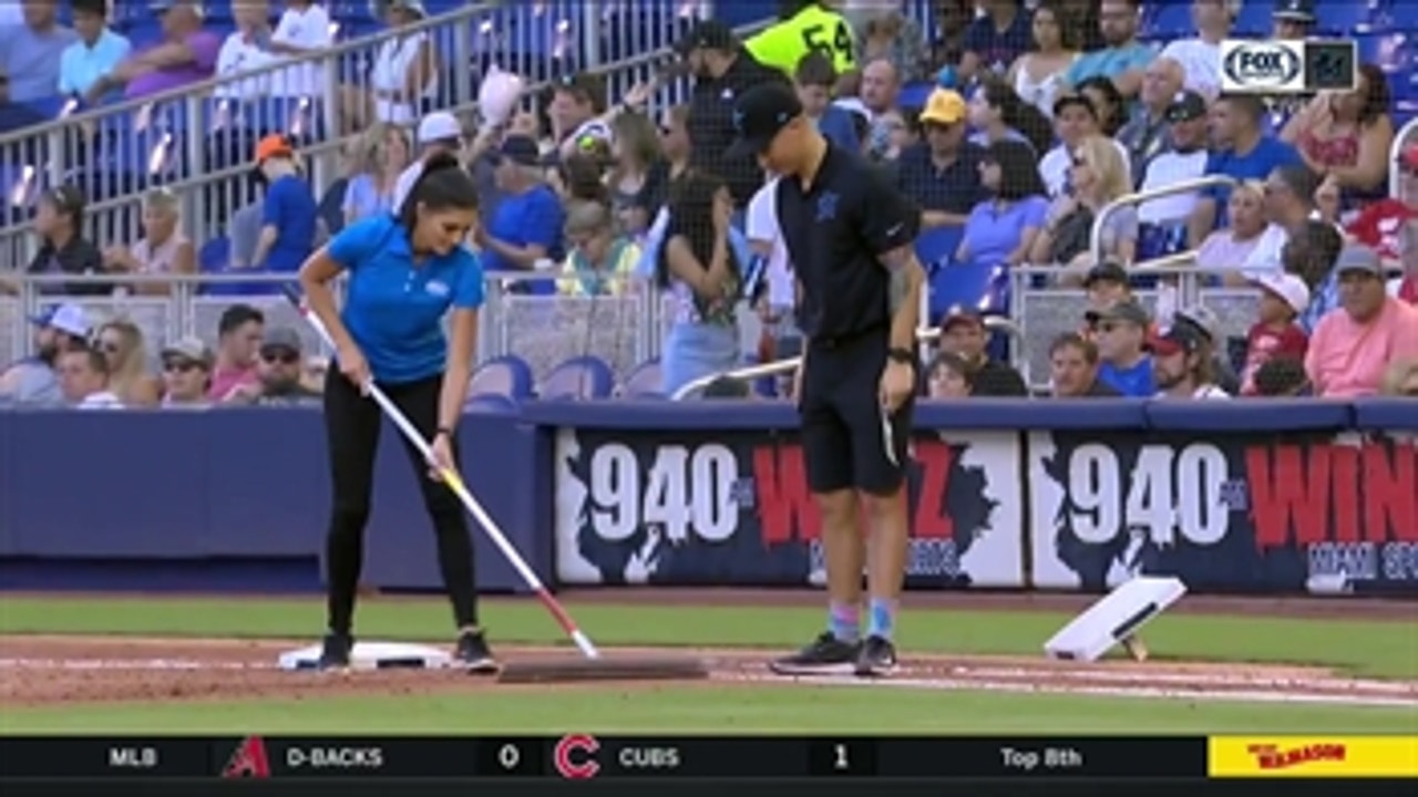 Kelly Saco becomes an honorary member of the Marlins' grounds crew