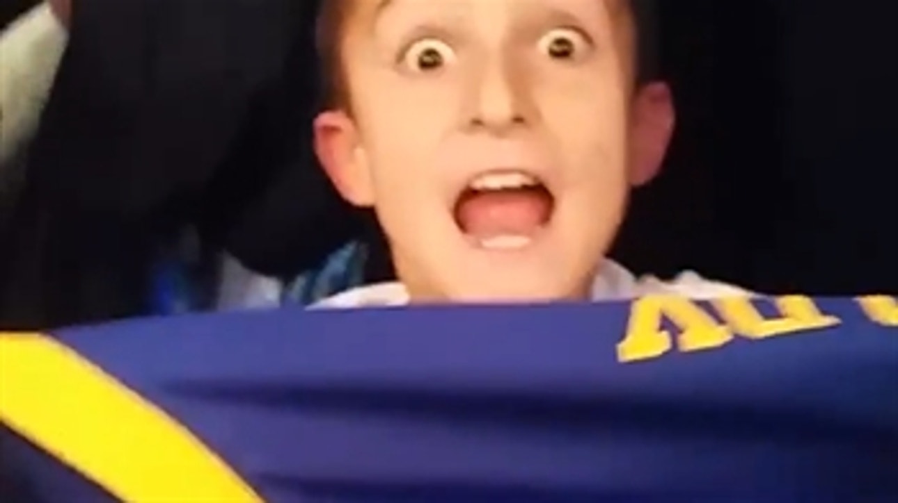 Watch a little kid lose his mind after getting Steph Curry's autograph