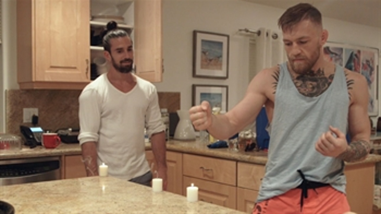 Conor McGregor does odd thing with candles; gets called a 'clown' by Jose Aldo's trainer