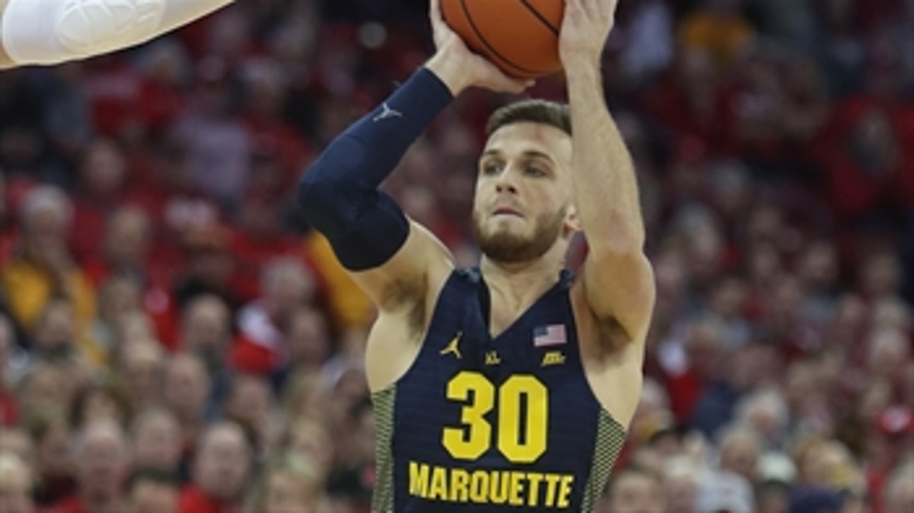 Andrew Rowsey and the Marquette Golden Eagles soar past the Wisconsin Badgers 82-63