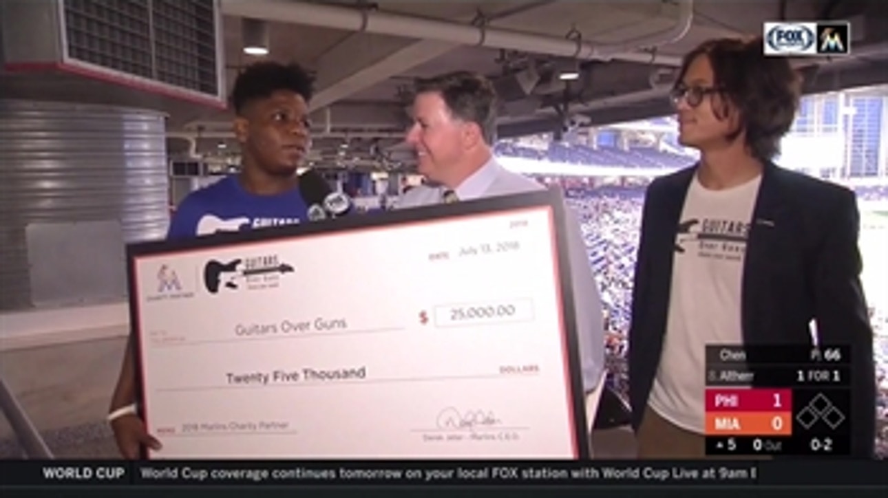 Marlins make charity donation to Guitars over Guns