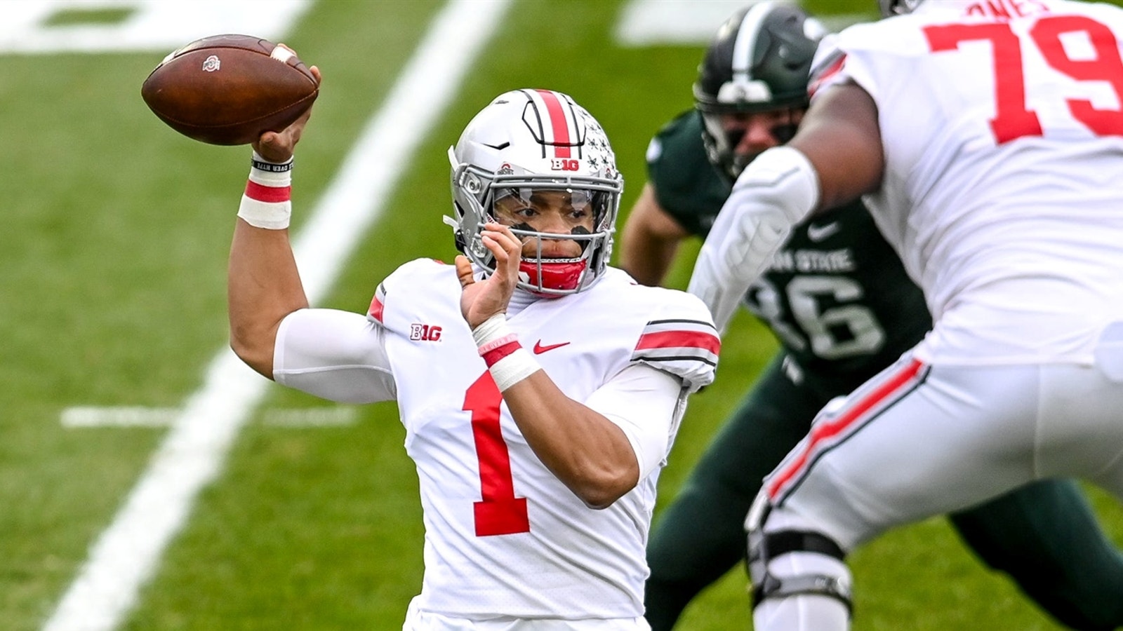 Justin Fields leads No. 4 Ohio State past Michigan State with four total touchdowns, 52-12