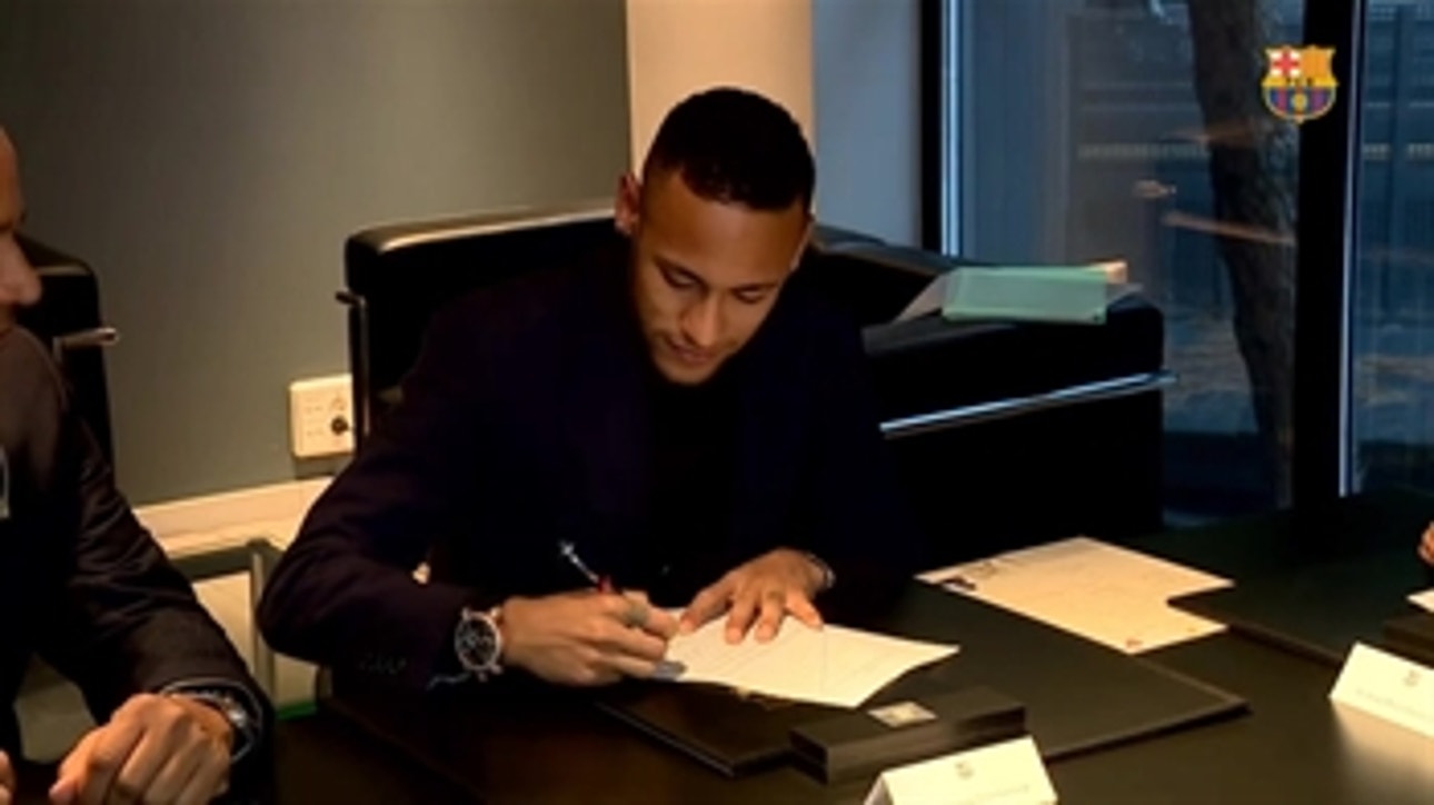 Neymar signs new contract at Barcelona