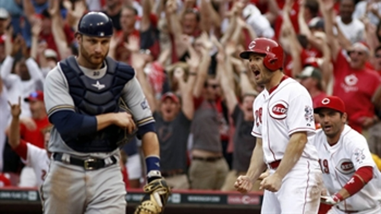 Brewers fall to Reds in extras