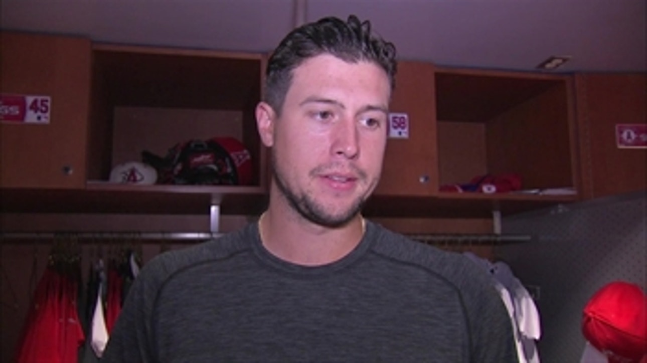 Tyler Skaggs (8 Ks in 6  innings vs. Rangers) talks with Alex Curry