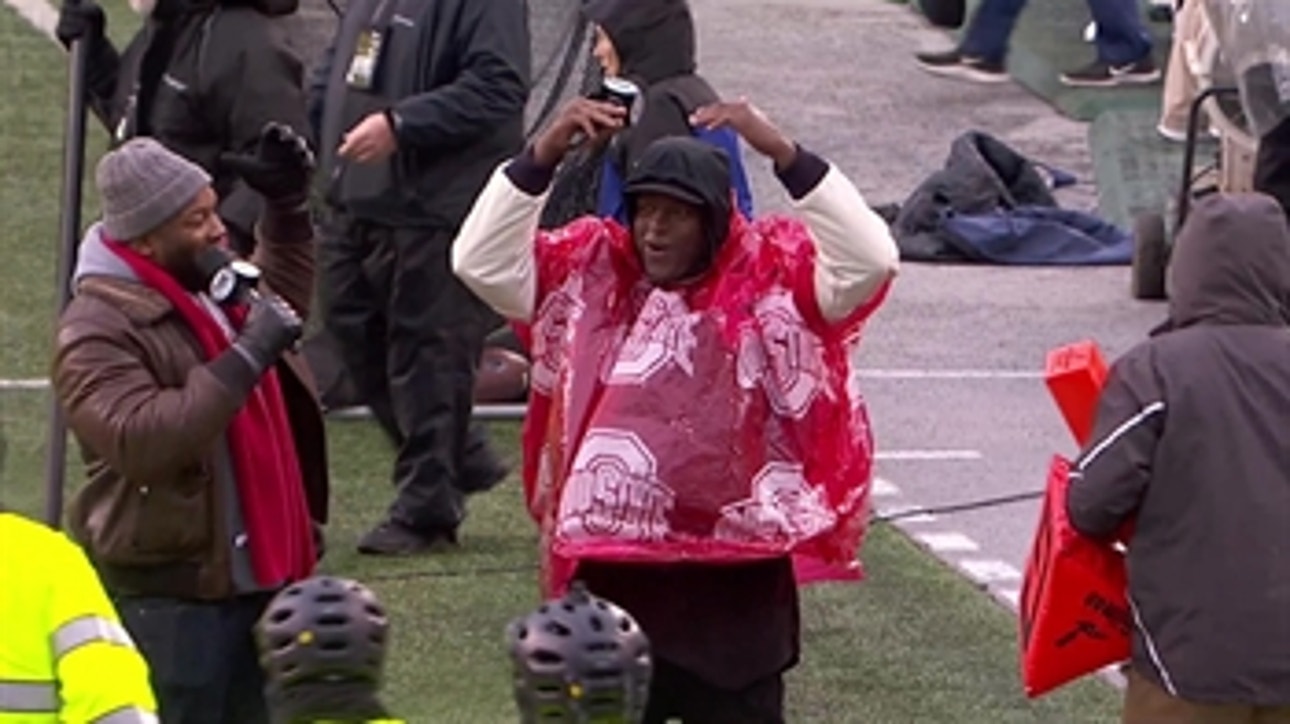 LaVar Arrington pays up on bet, does O-H-I-O in Buckeye poncho at Ohio Stadium
