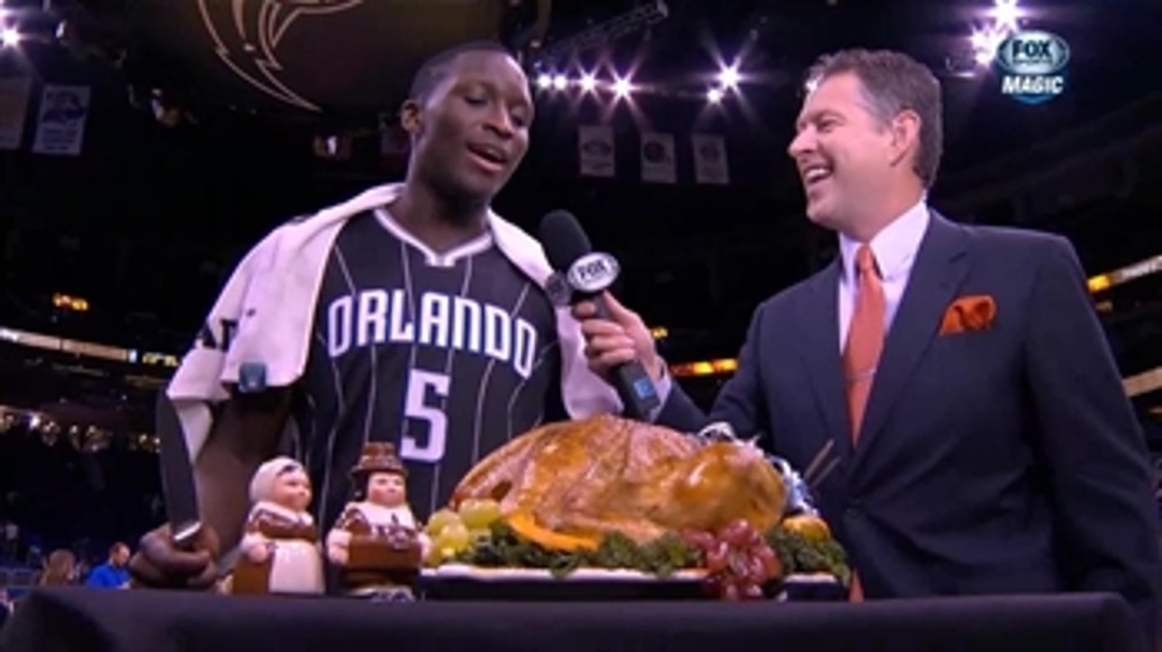 Victor Oladipo digs into some turkey