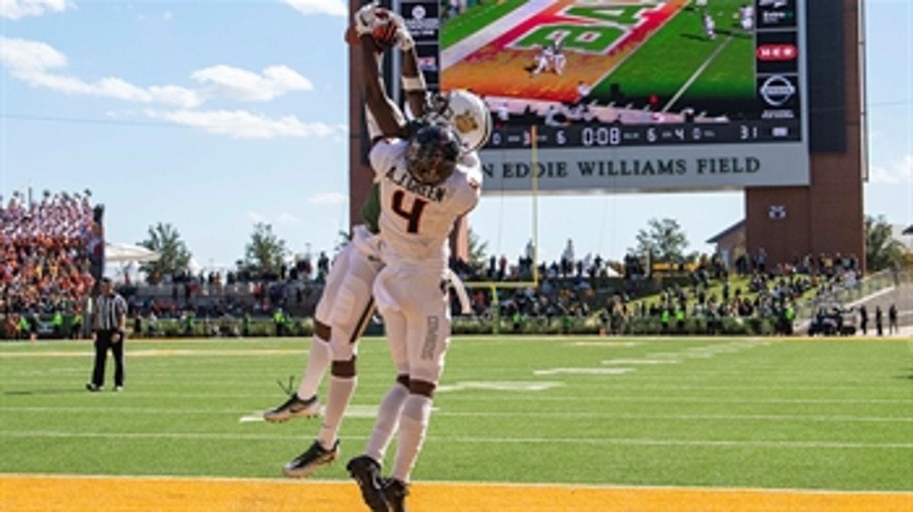 Brewer's last second touchdown pass helps Baylor take down Oklahoma State 35-31