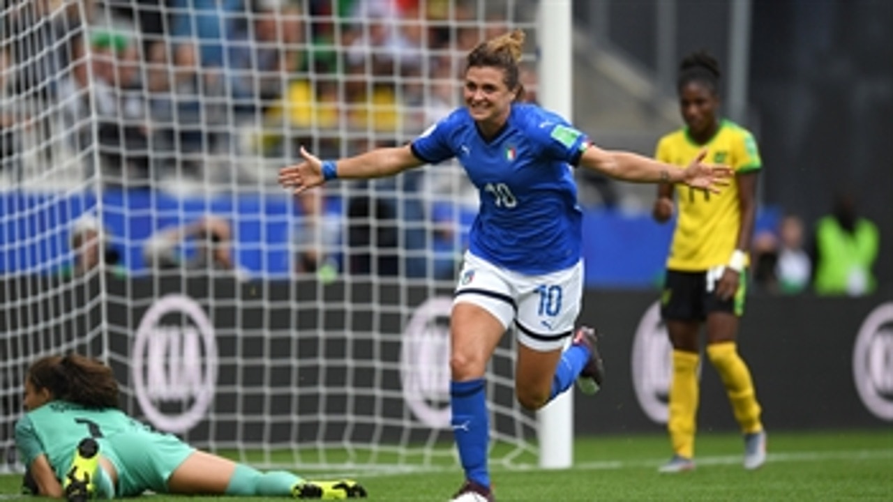 Italy's Cristiana Girelli scores her 2nd goal with her thigh