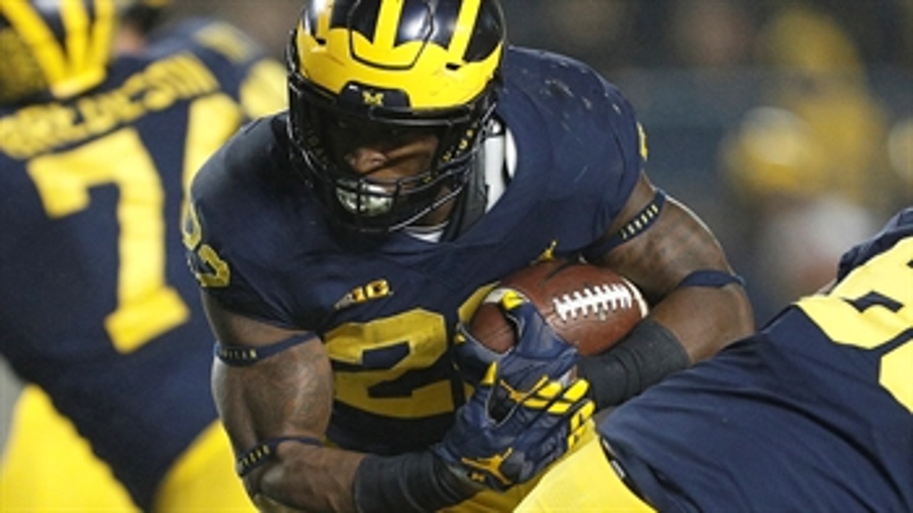 Karan Higdon bulldozes his way into the end zone to put the Wolverines up 20-14 over the Buckeyes