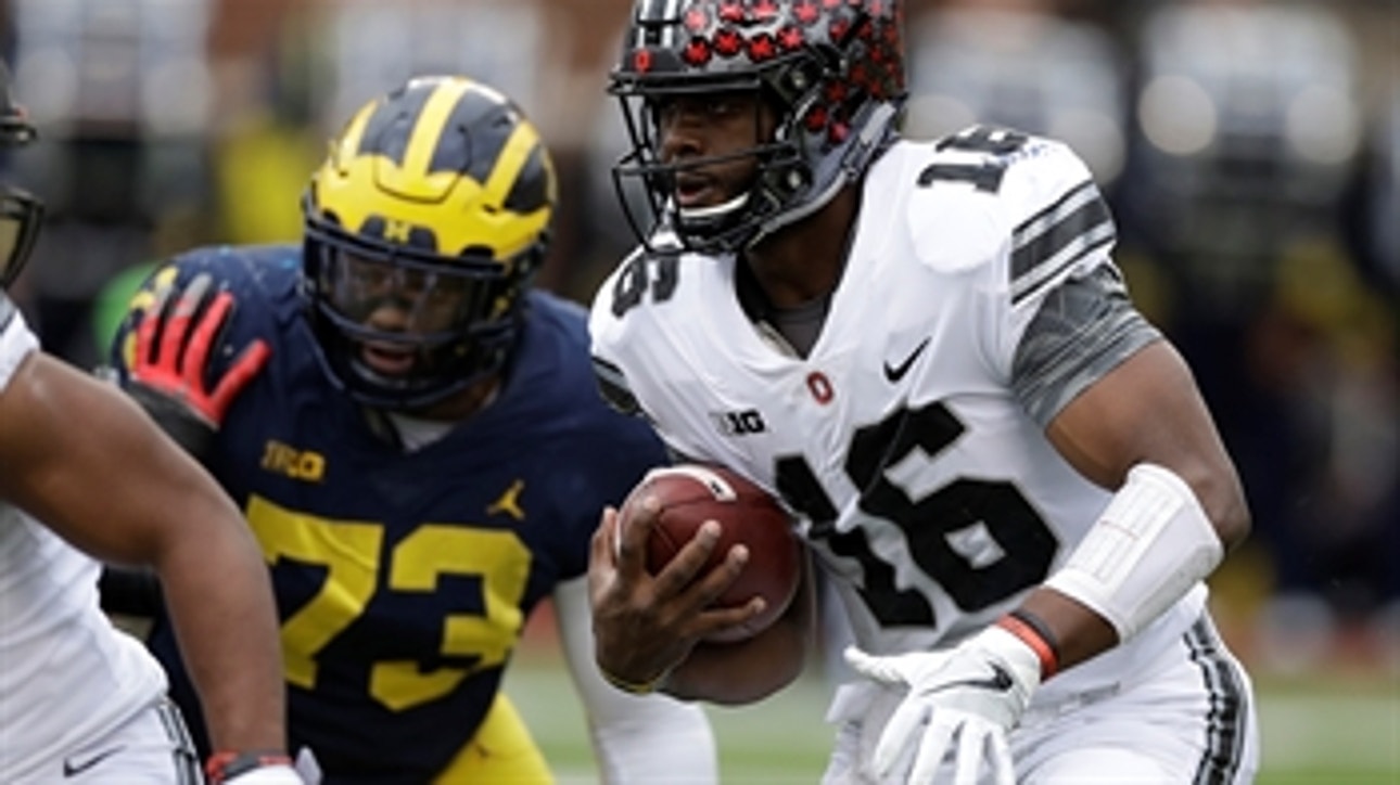 J.T. Barrett rolls out and cuts through the Wolverines' defense to narrow Michigan's lead to 14-7