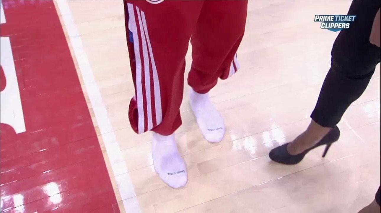 CP3 gives all, including shoes, in win