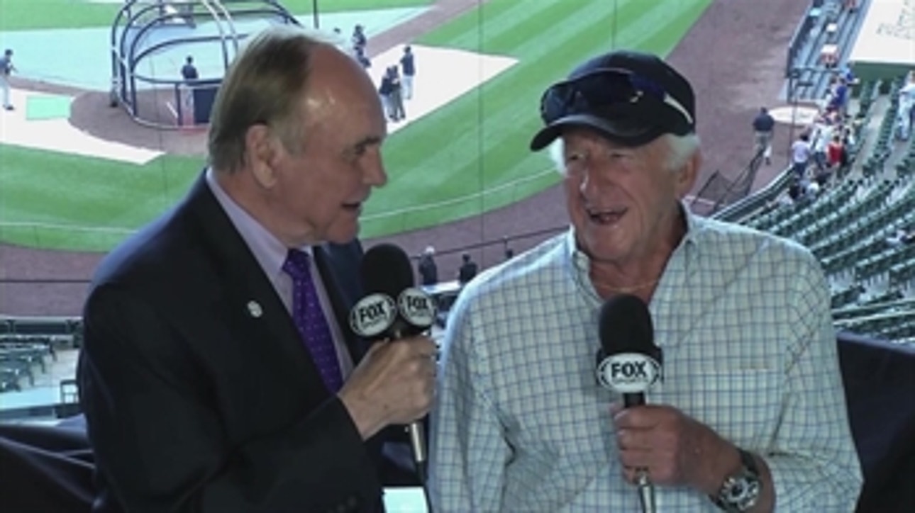 Bob Uecker tells Dick Enberg he calls slow pitch softball games for senior citizens