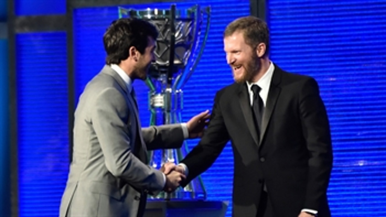 Dale Earnhardt Jr. presents Chase Elliott with the NASCAR Cup Series Most Popular Driver award