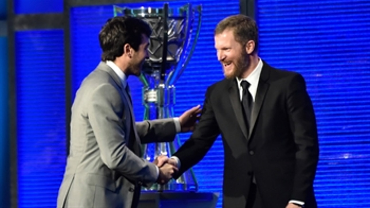 Dale Earnhardt Jr. presents Chase Elliott with the NASCAR Cup Series Most Popular Driver award