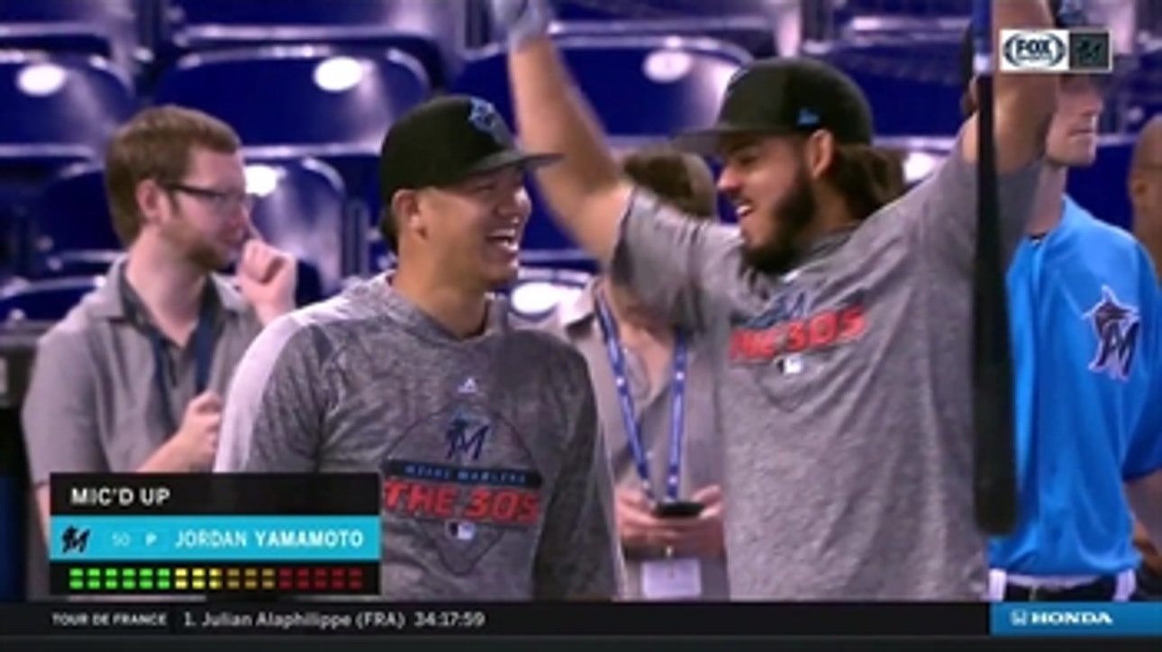 Marlins rookie Jordan Yamamoto rocks a mic during warmups