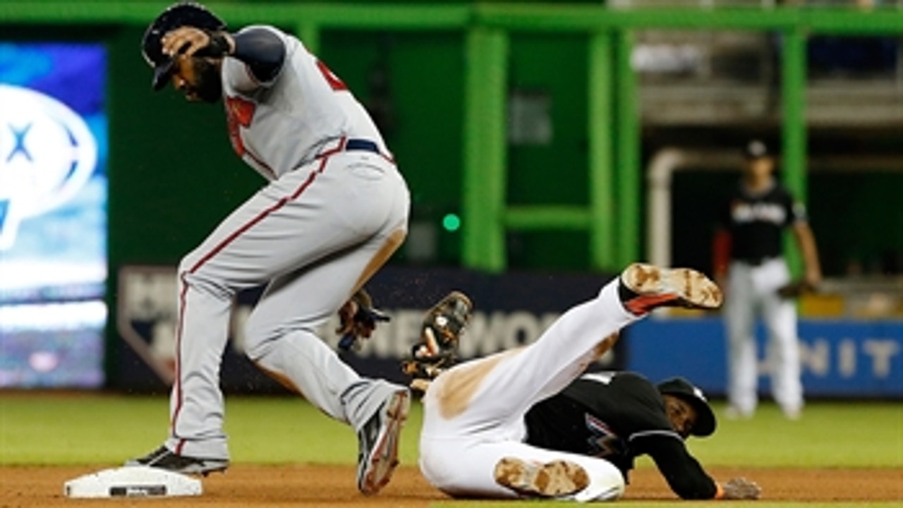 Marlins dropped by Braves in extras