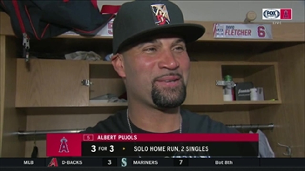 Albert Pujols all smiles following 3-for-3 day