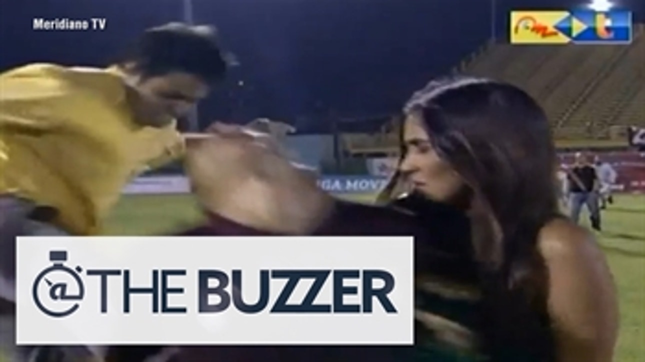 Watch a soccer player get absolutely decked from behind by a fan during a live interview