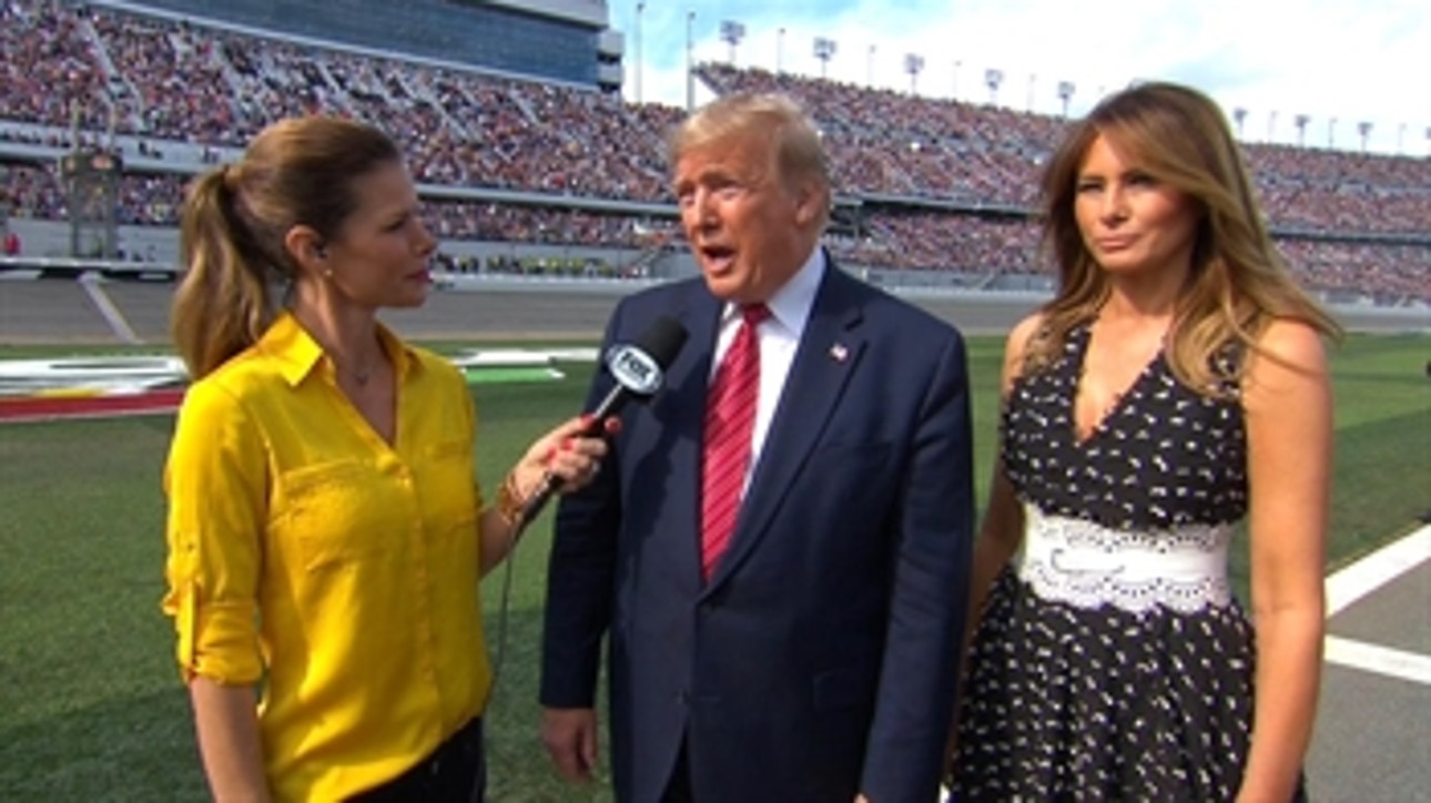 President Donald Trump speaks with Jamie Little before the Daytona 500, where he will serve as Grand Marshal for today's race