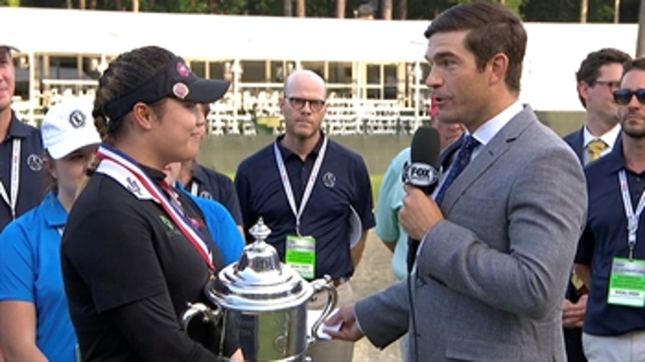 Ariya Jutanugarn talks with Shane Bacon after winning US Women's Open in dramatic fashion